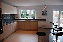 A fine example of a beautifully designed kitchen that is both highly functional and atmospheric